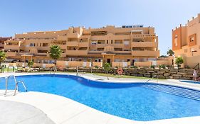 Bajo con Jardin y Piscina cerca de la Playa Dos Dormitorios